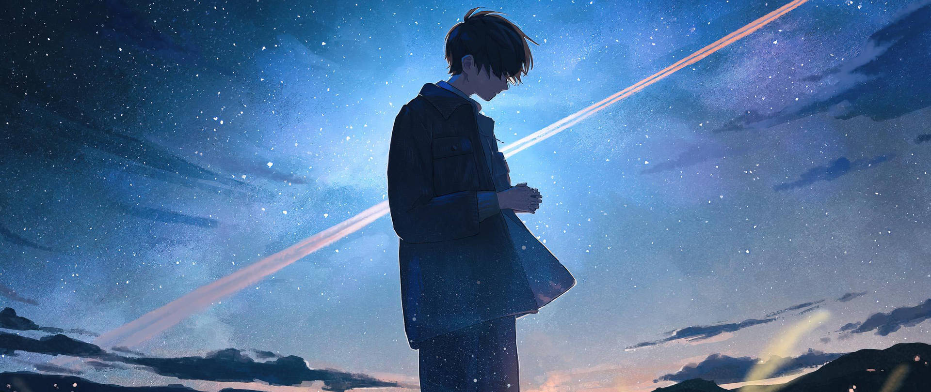 一個穿著外套的年輕男子站在星光燦爛的暮色天空下，天空中有發光的條紋。