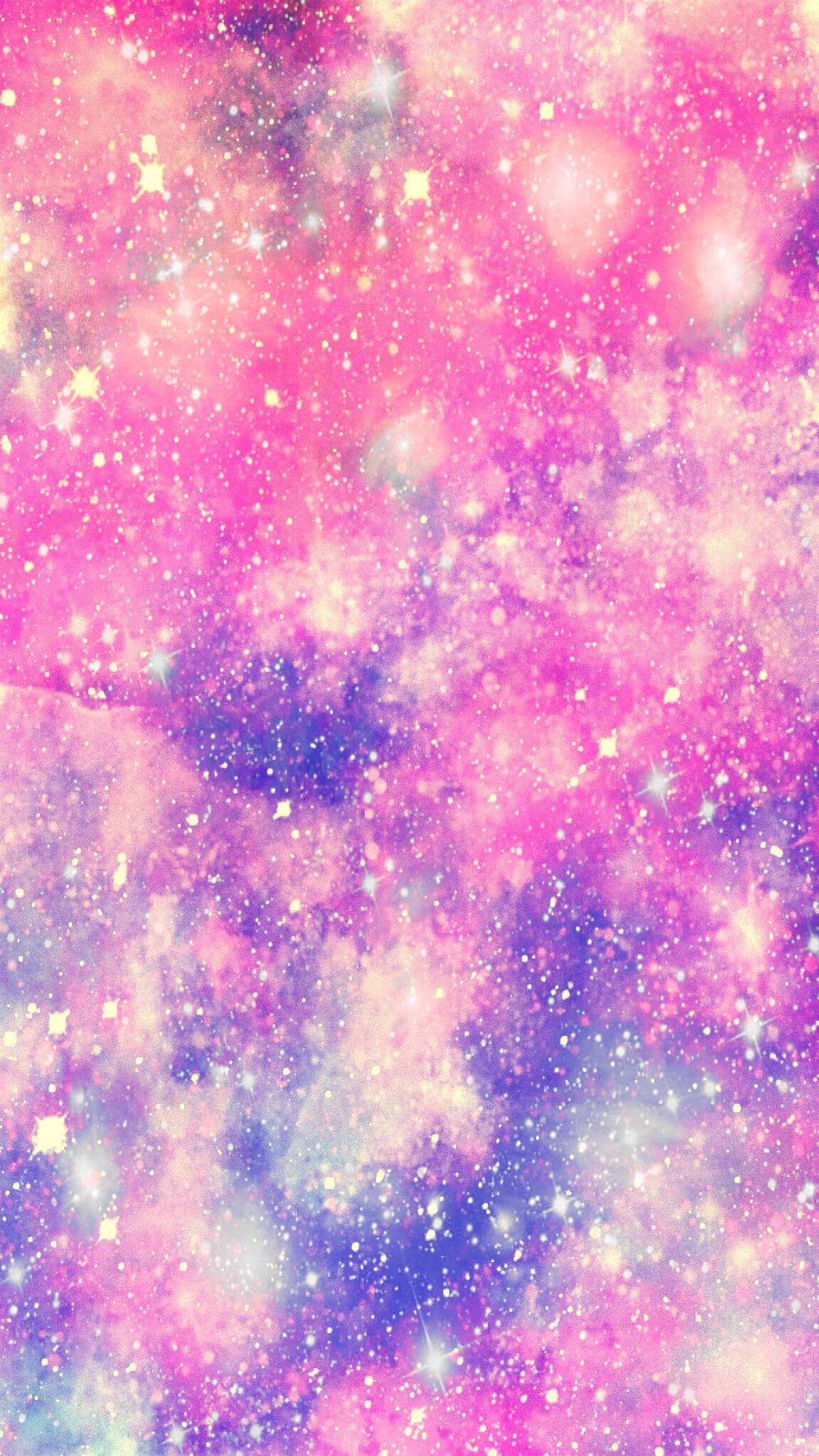 銀河 桌布 壁紙 — 夢幻的宇宙星雲旋轉著充滿活力的粉紅色、紫色和藍色色調，點綴著閃爍的星星。