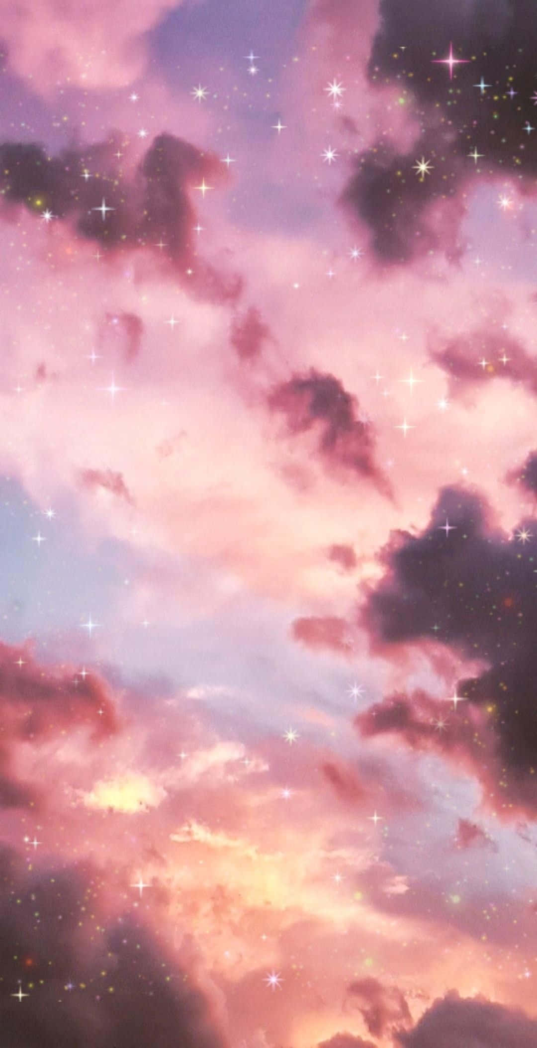 dreamy 桌布 壁紙 — 夢幻的暮色天空，以柔和的粉紅、紫色和金色繪成，閃爍的星星散落在蓬鬆的雲朵上。
