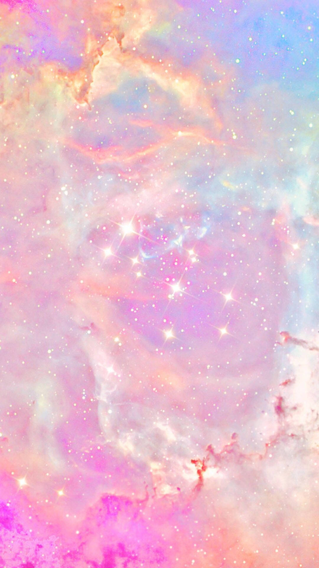 銀河 桌布 壁紙 — 夢幻粉彩星系，粉紅、藍色和橙色星雲旋轉交織，點綴閃爍繁星。