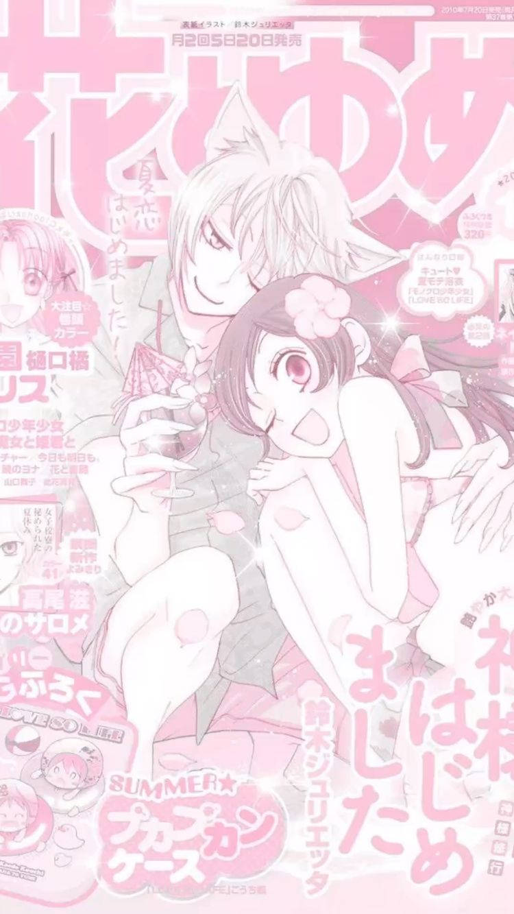 動漫雜誌封面，粉紅色頭髮的女孩和狐狸耳男孩拿著飲料。