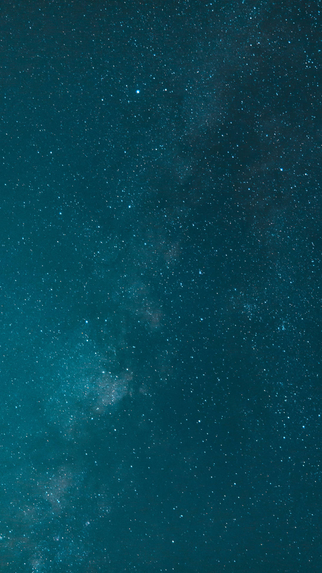 深藍綠色夜空中的銀河系，佈滿星星和星雲