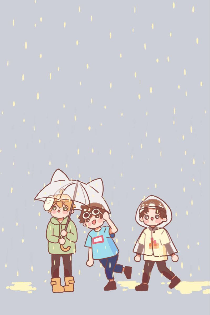 三個穿著雨衣的小孩在貓耳雨傘和水坑的雨中行走。
