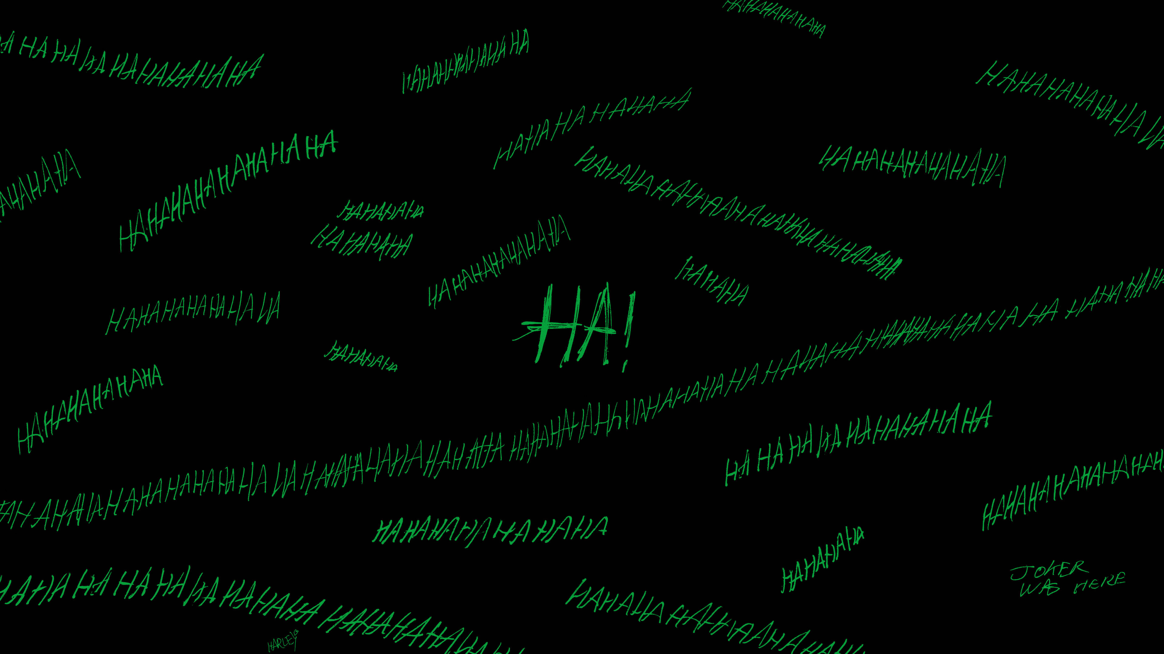 大笑小丑曾在此 壁紙 — 綠色手寫笑聲文字「HA!」和「NANANA」在黑色背景上動態漂浮。