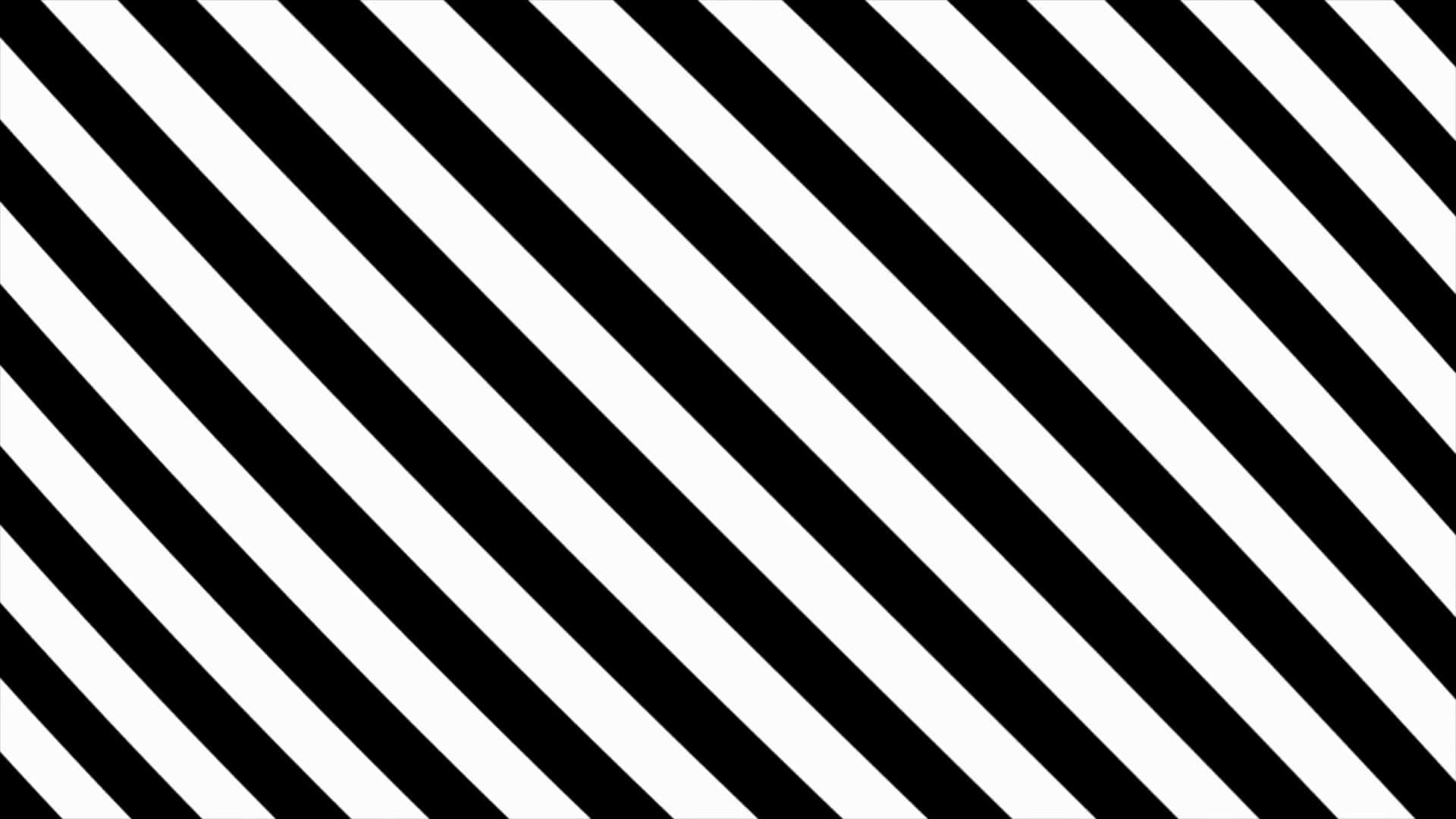 Stripes 桌布 壁紙 — 大膽的對角黑白條紋在整個畫面中創造出高對比度的幾何圖案。