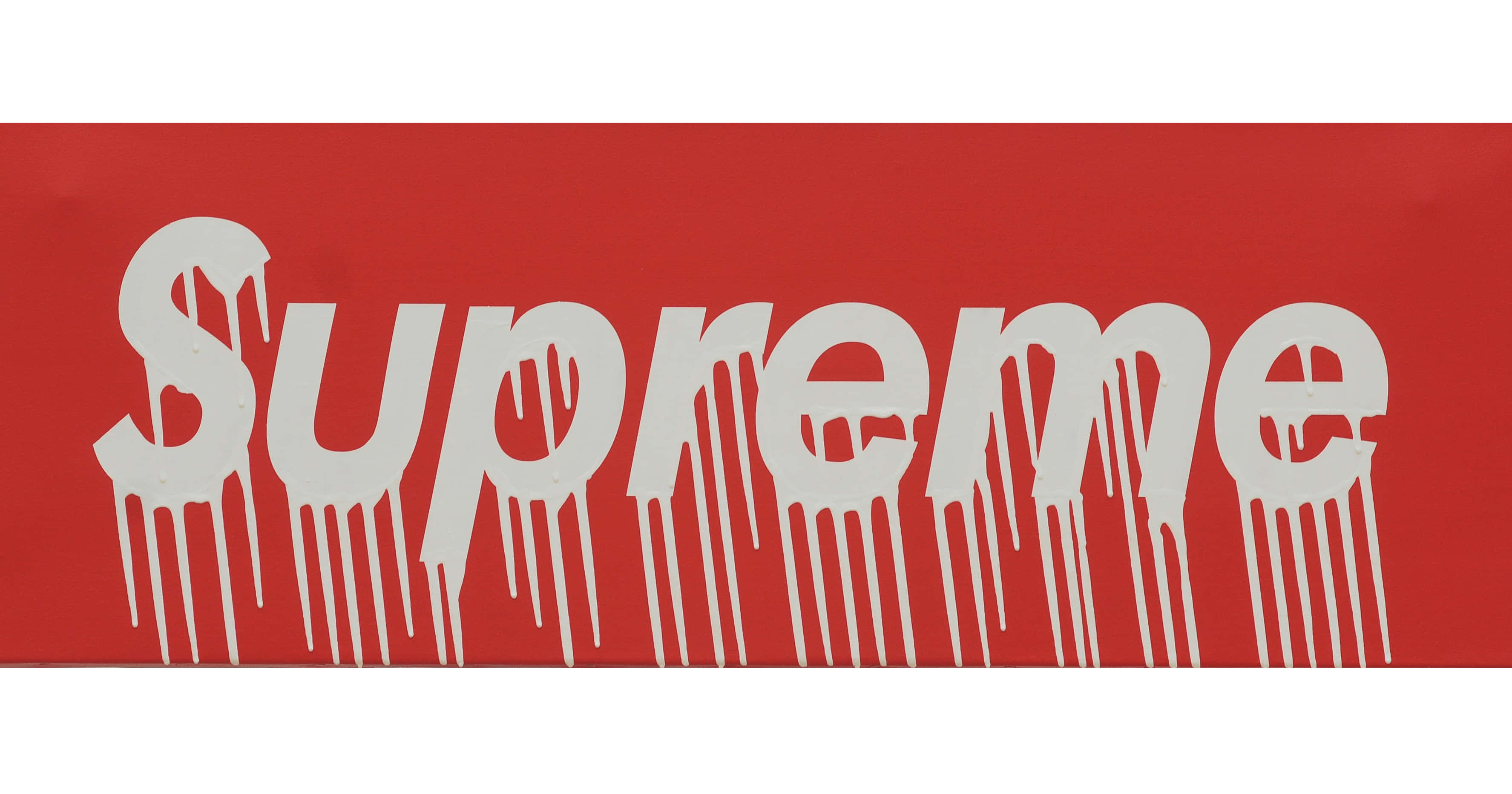 滴落效果 桌布 壁紙 — 大膽的白色 'Supreme' 標誌在純紅色背景上滴落，呈現極簡圖形設計。