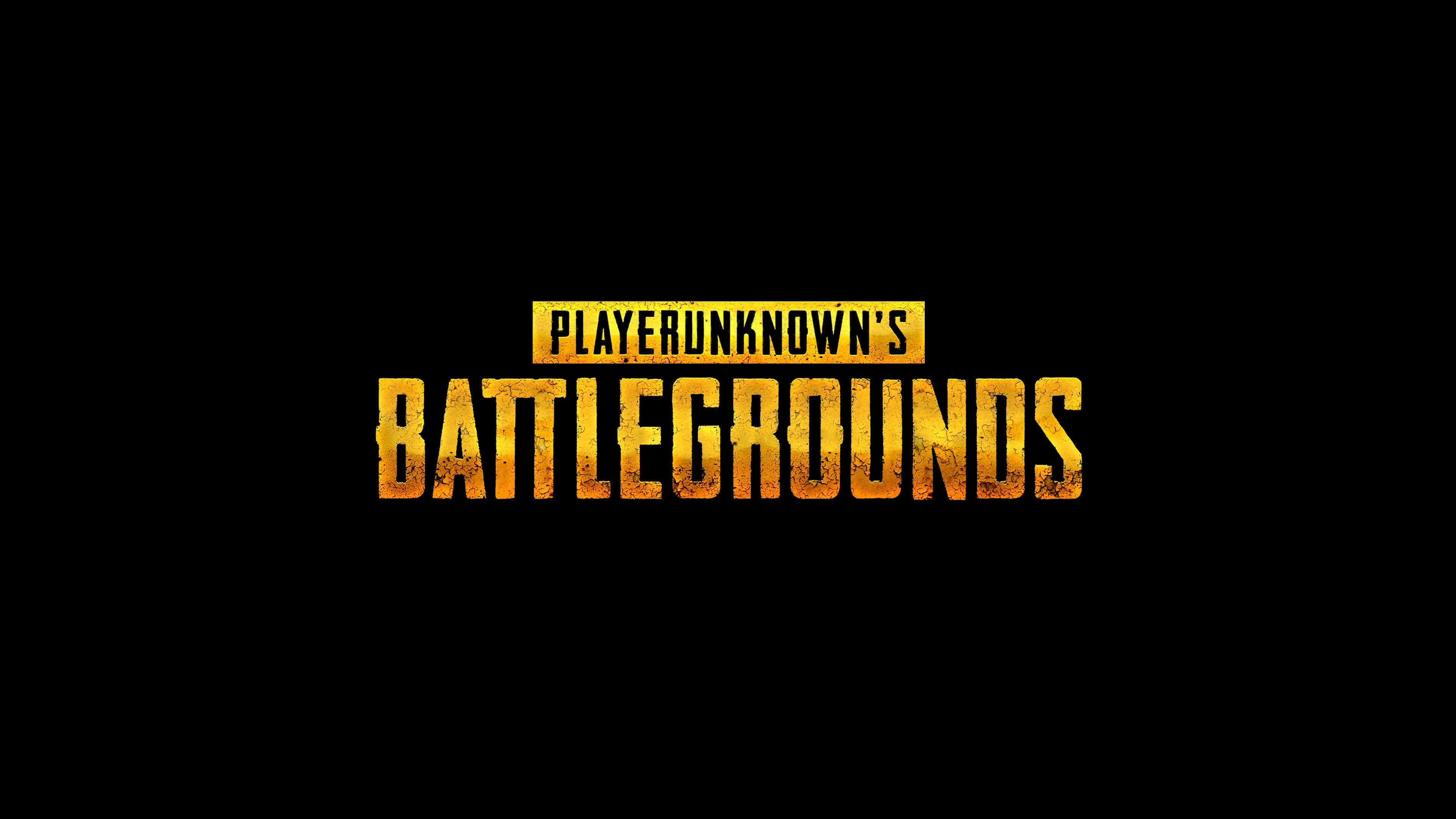 Pubg Logo 桌布 壁紙 — 大膽的金色紋理 PUBG 標誌，居中放置在帶有粗糙磨損效果的純黑背景上。