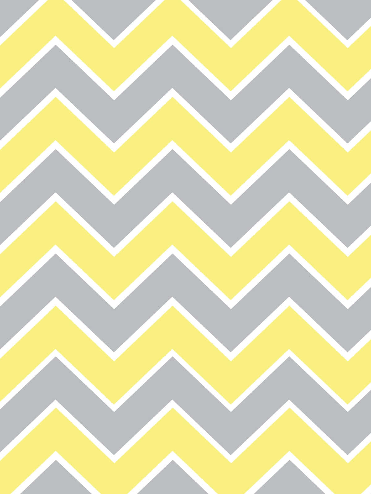 Cute Chevron 桌布 壁紙 — 大膽的黃灰人字形圖案配以清晰的白色輪廓，營造出現代幾何牆紙設計。
