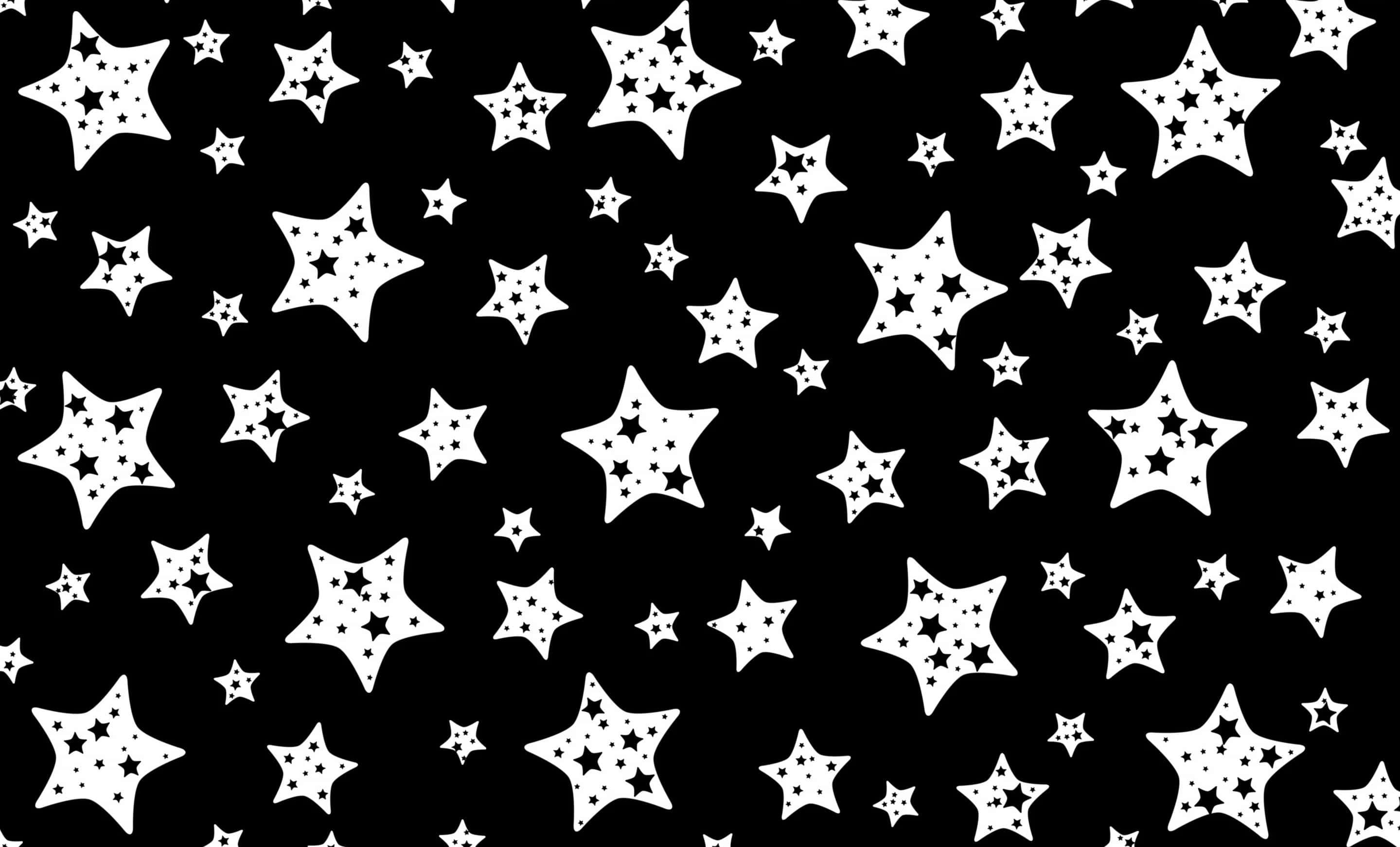 Black And White Star 桌布 壁紙 — 大膽的黑白牆紙，散佈著不同大小的星星形狀，內部帶有星星圖案。
