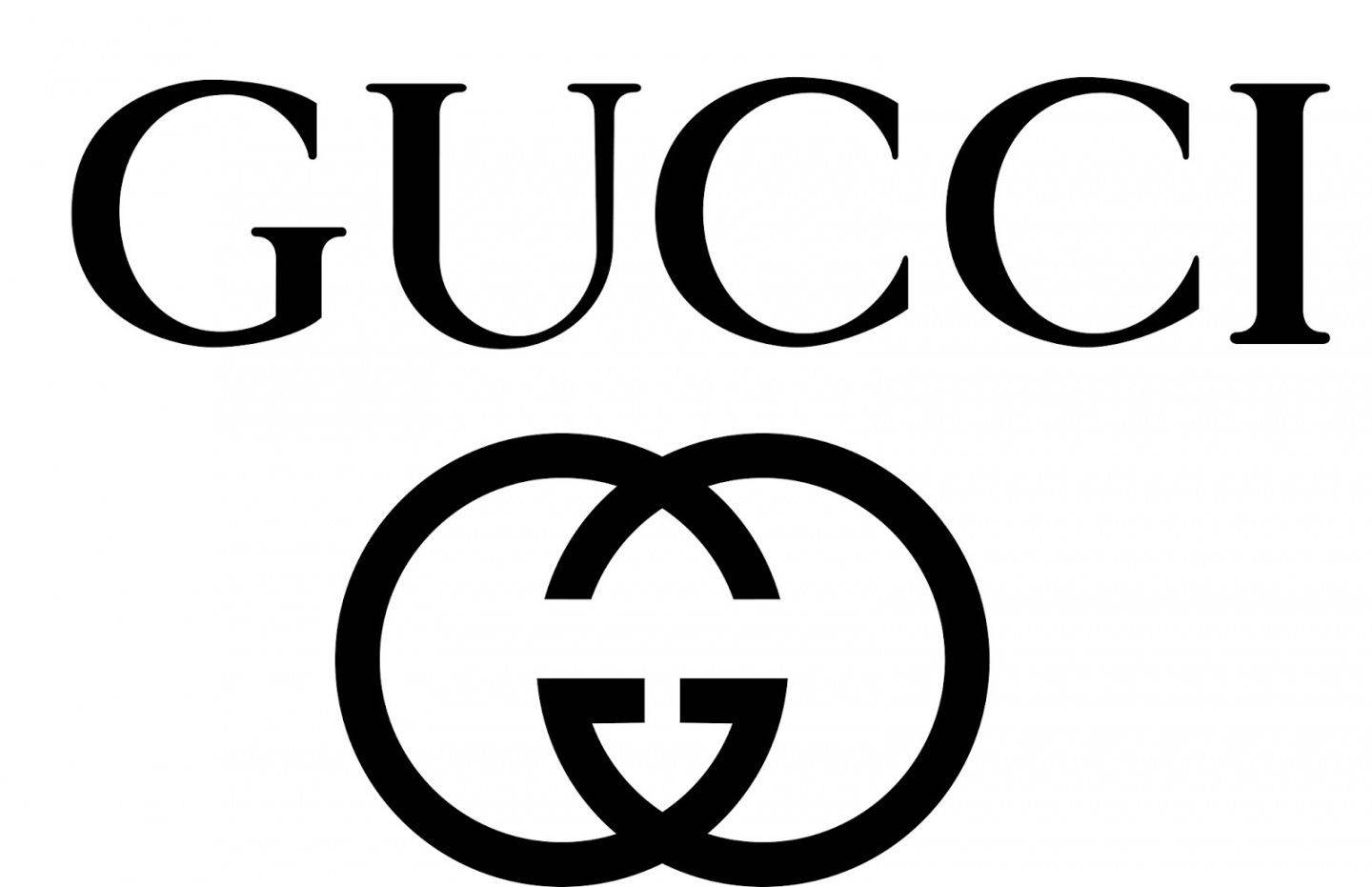 Gucci 桌布 壁紙 — 大膽的黑色Gucci標誌，帶有交織的G字母，背景為純白色。