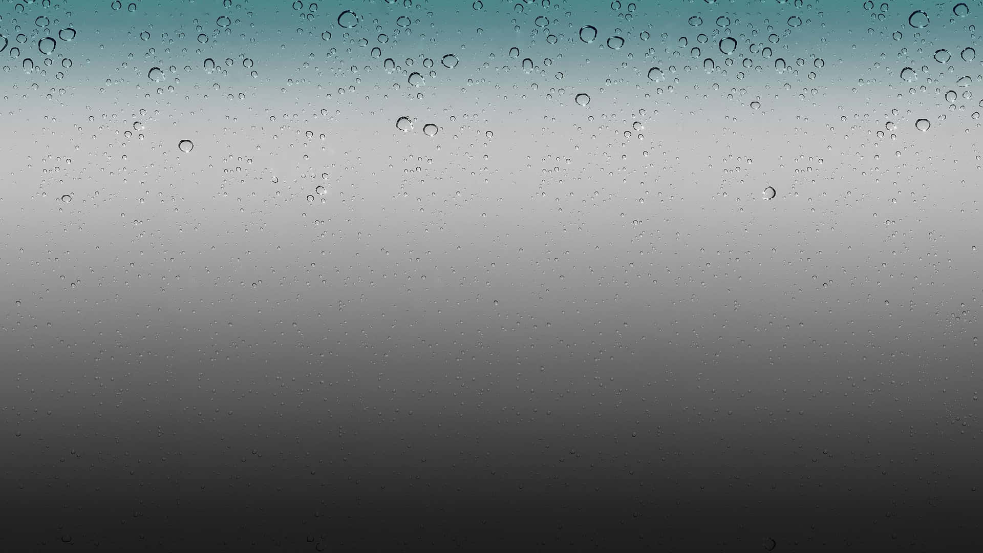 玻璃上的雨滴，背景為藍灰色漸層