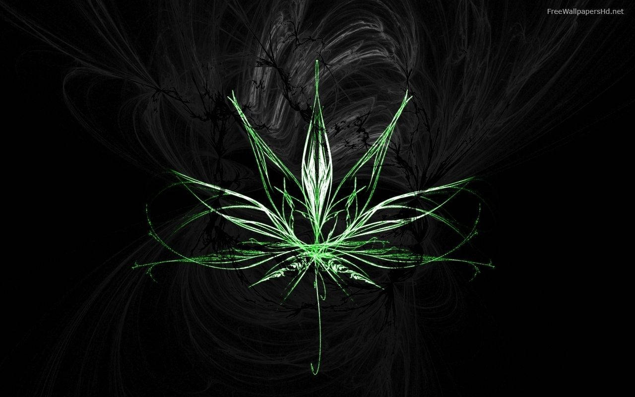 發光綠色分形大麻葉在深色旋轉背景上