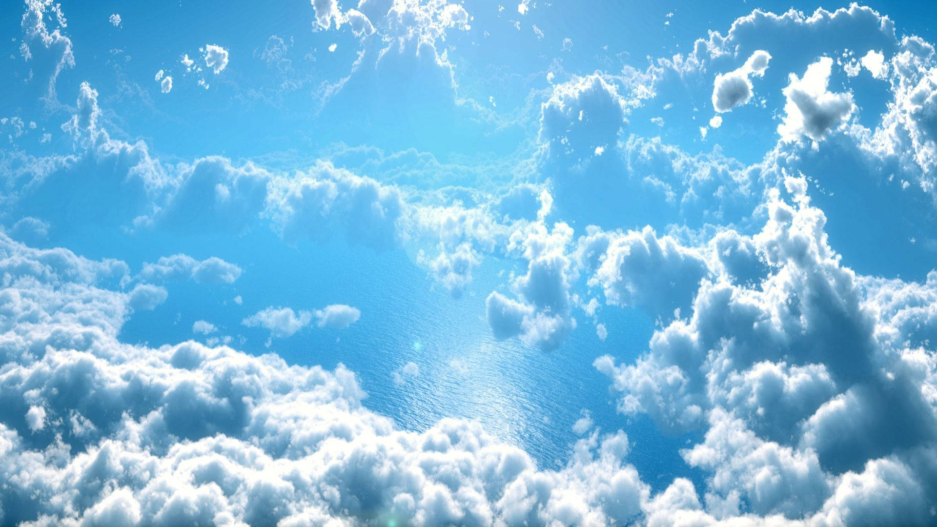 明亮的藍天，有蓬鬆白雲和陽光。