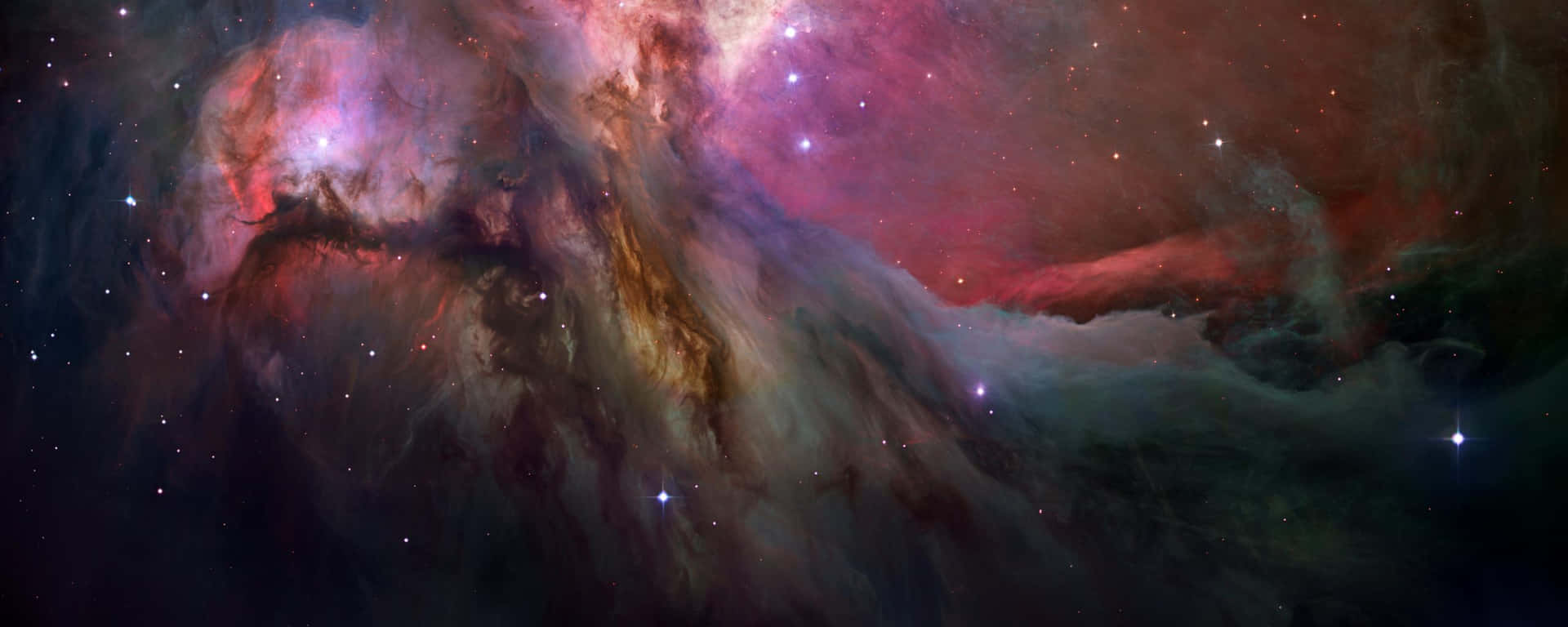 一個色彩繽紛的星雲，在深空中帶有發光的雲層和散落的星星。