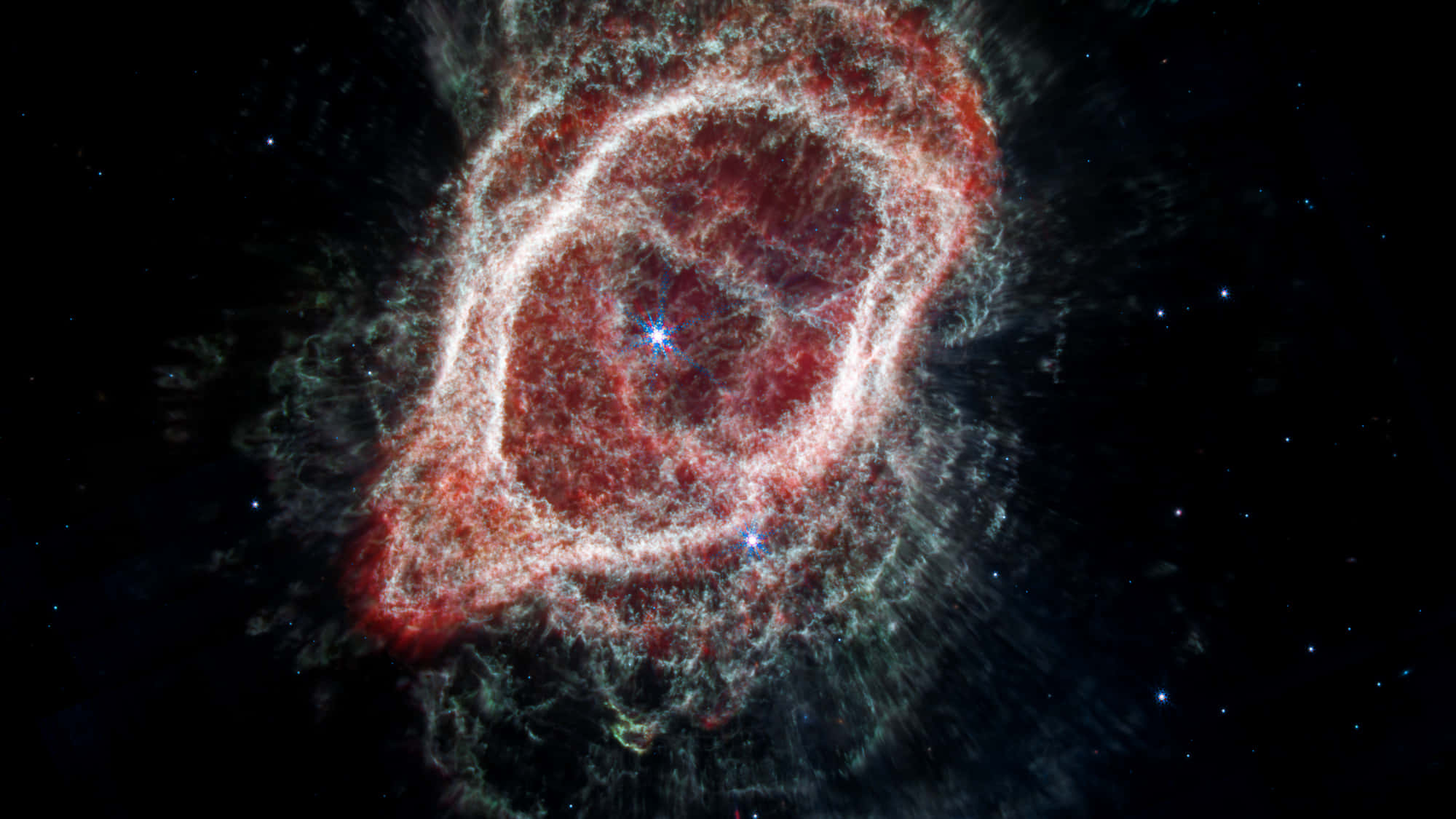 天文學南方環狀星雲 壁紙 — 一個充滿活力的紅色和白色宇宙星雲，帶有發光的星星，在深空的星場中脈動。