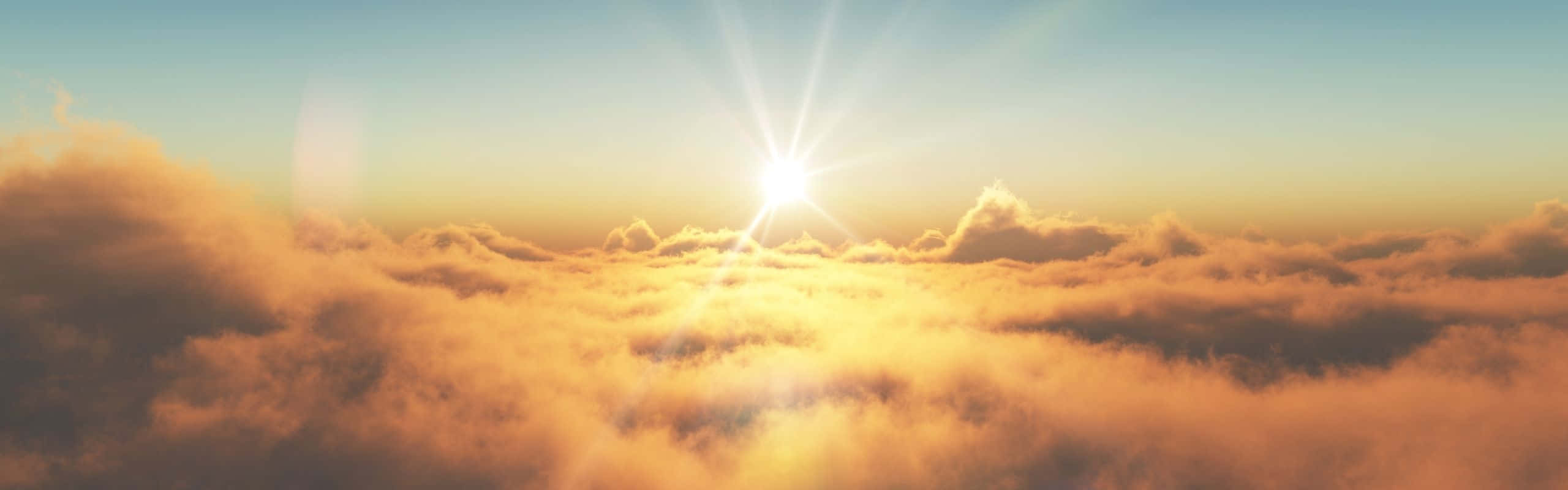 太陽從雲海上升起，散發出金色光芒