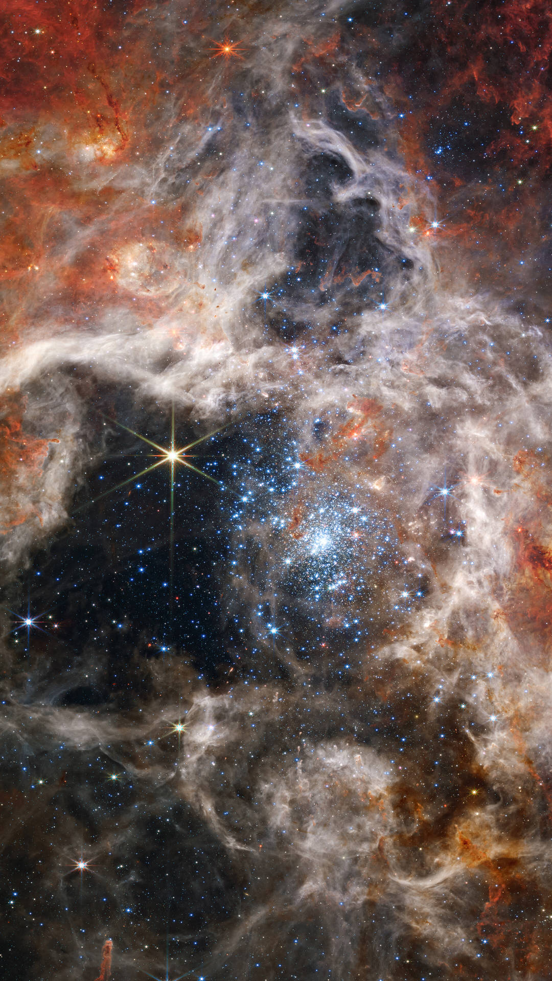 充滿活力的宇宙星雲，帶有發光的星星和旋轉的氣體和塵埃雲。