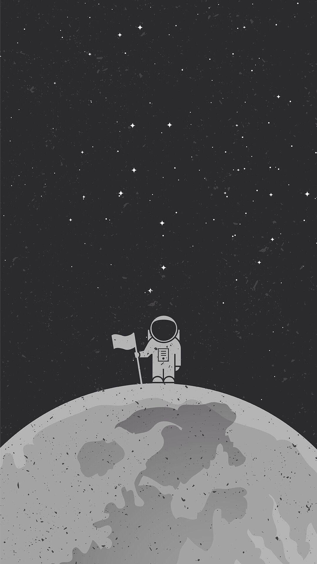 月球上一位孤獨的太空人在星空下插旗。