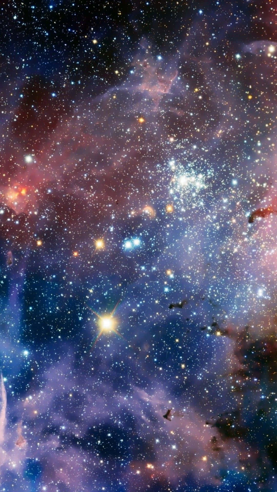 太空星雲背景：卡里納星雲 壁紙 — 令人嘆為觀止的宇宙景觀，充滿了在深空中旋轉的發光恆星和色彩繽紛的星雲。