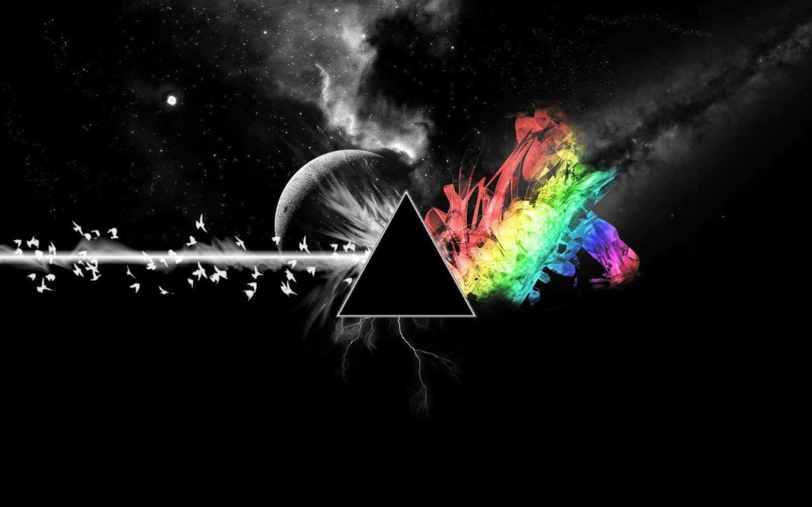 太空霓虹抽象最佳電腦背景 壁紙 — 一個黑色三角形將一個宇宙場景分割，其中包含一個單色行星和充滿活力的彩虹星雲，背景是繁星點點的虛空。