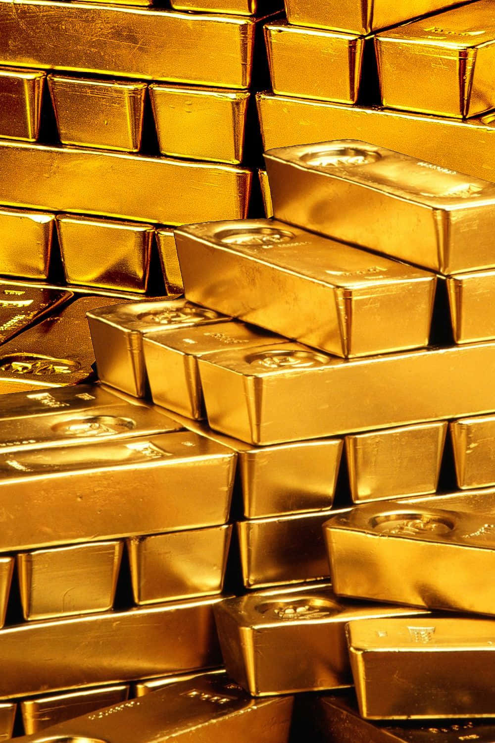 奢華流光金 壁紙 — 閃閃發光的金條堆在特寫鏡頭中反射出溫暖的光線，強調其金屬光澤和精確邊緣。