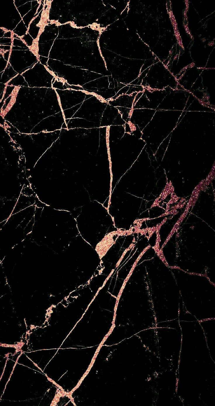 玫瑰金 iPhone 桌布 壁紙 — 奢華的黑色大理石表面，帶有複雜的玫瑰金紋理和微妙的閃爍亮點。