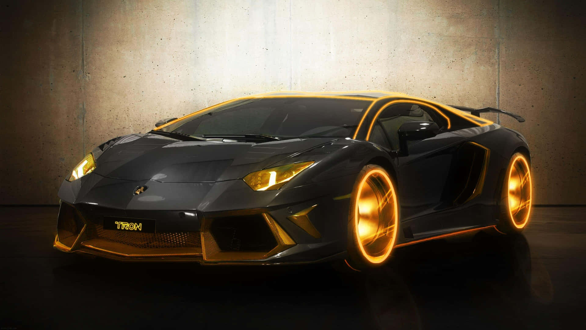 黑色林寶堅尼 Aventador，在工作室環境中帶有發光的金色輪圈和飾邊。