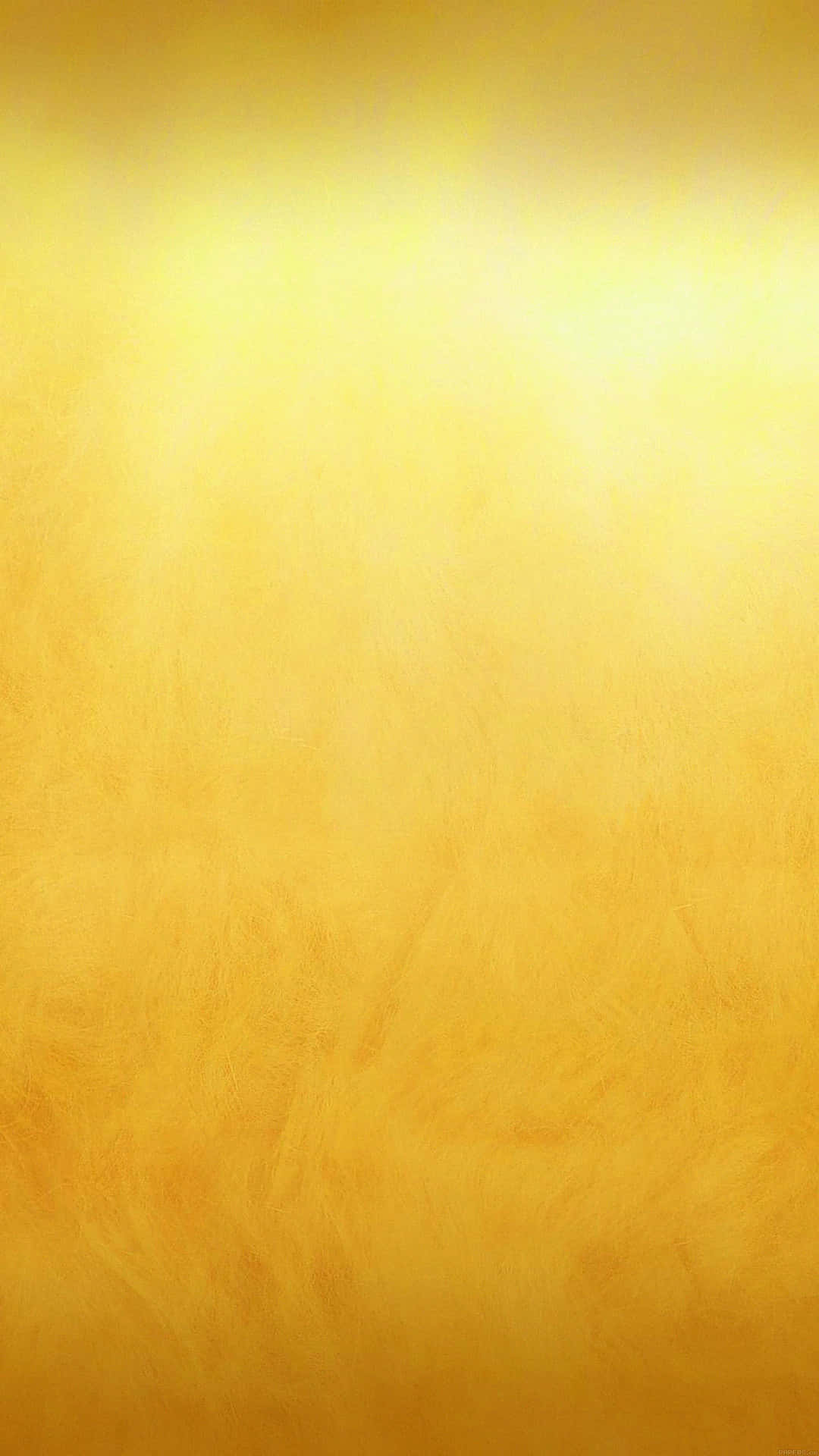 帶有柔和筆觸的金黃色紋理漸變背景。