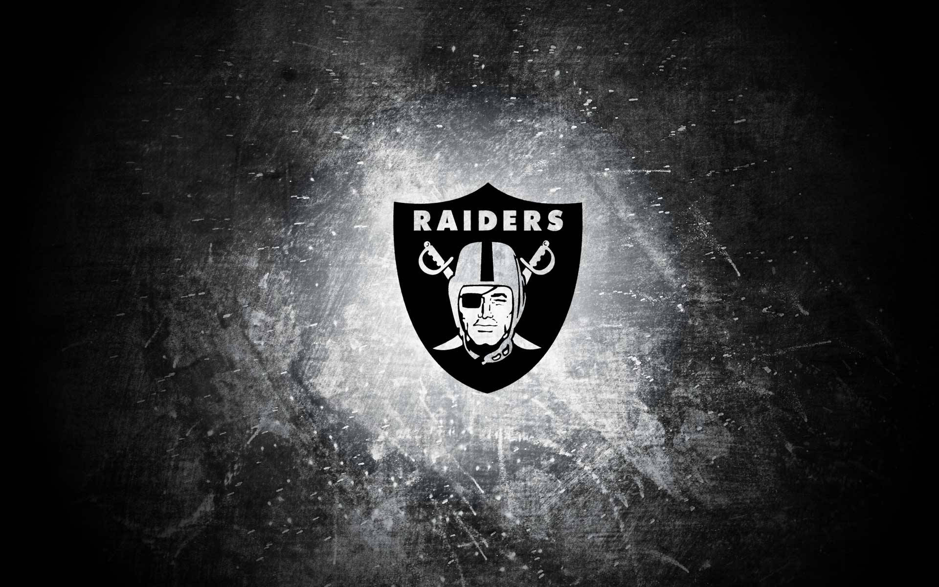 Raiders 標誌在紋理深色背景上帶有發光效果