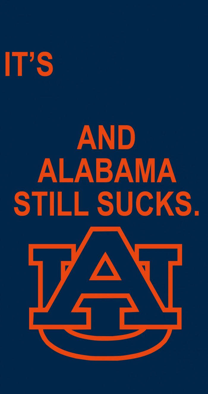 奧本老虎標誌，帶有橙色粗體文字 'IT'S AND ALABAMA STILL SUCKS' 在深藍色上。