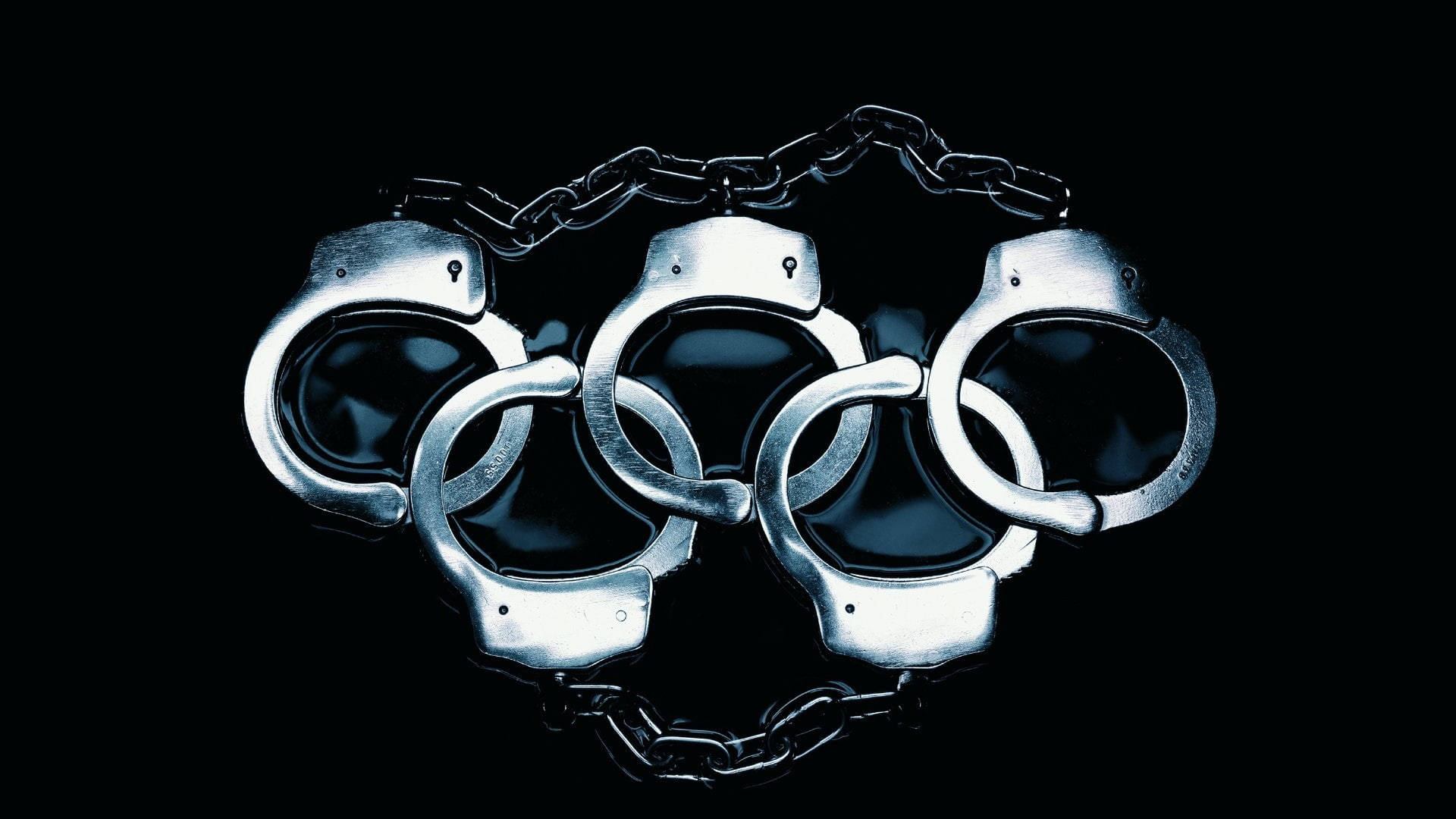 黑色背景上由手銬組成的奧運五環。