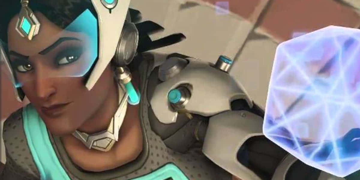 Overwatch Symmetra 桌布 壁紙 — 女性英雄身穿未來盔甲，手持發光藍色能量球的特寫。
