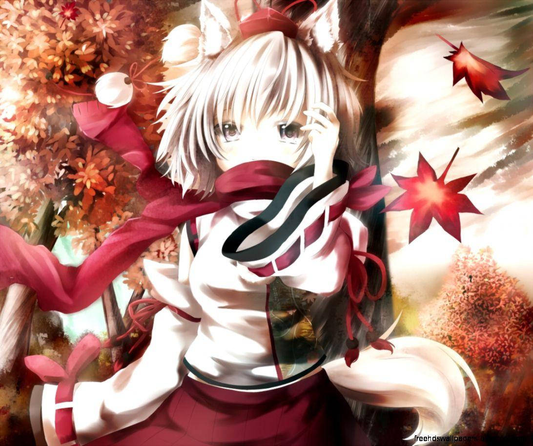 女狐誘惑角色 壁紙 — 動畫女孩，有狐狸耳朵和紅色圍巾，站在溫暖金色光線下飄落的秋葉中。