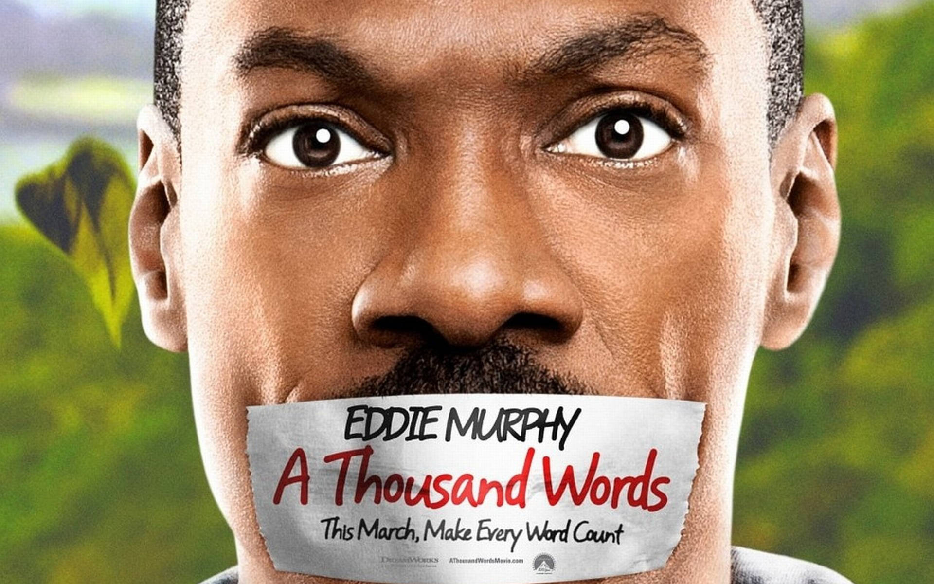 艾迪·墨菲嘴上貼著膠帶宣傳電影《A Thousand Words》。