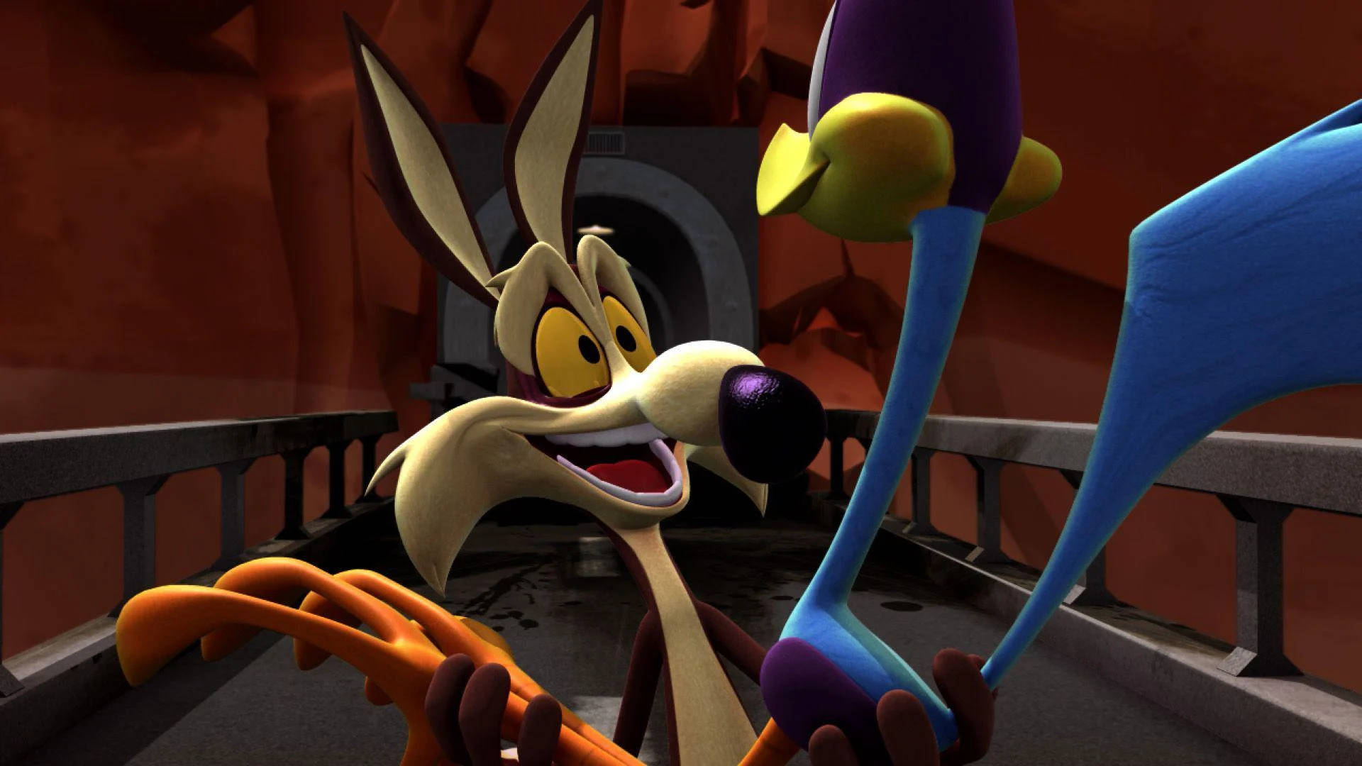 Wile E. Coyote 喺橋上拎住一個色彩繽紛嘅裝置，露出笑容。