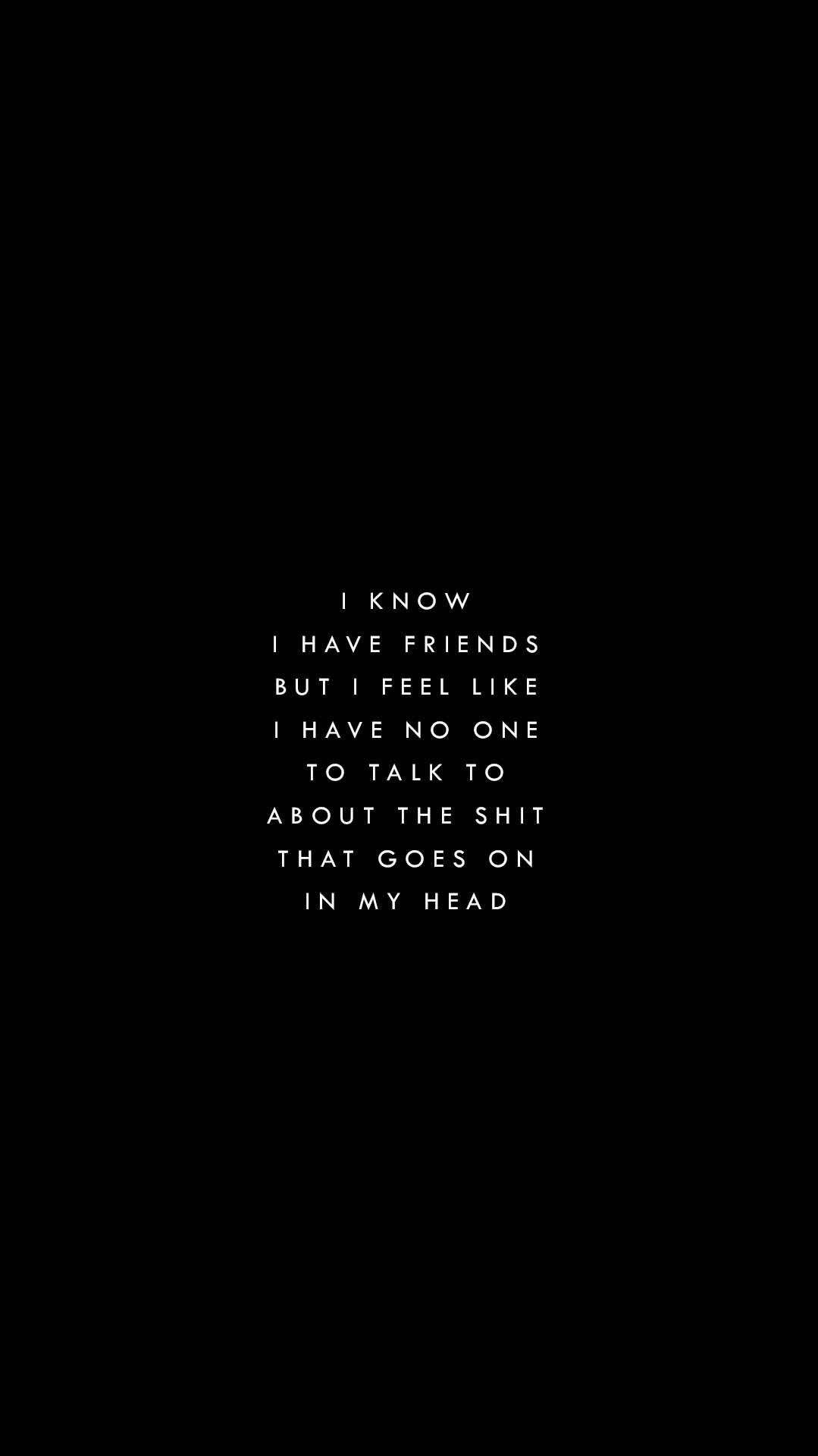 孤獨美學鎖屏，配詩意金句 壁紙 — 黑色背景上的白色文字，讀到一段關於即使有朋友仍感到孤立的原始情感告白。