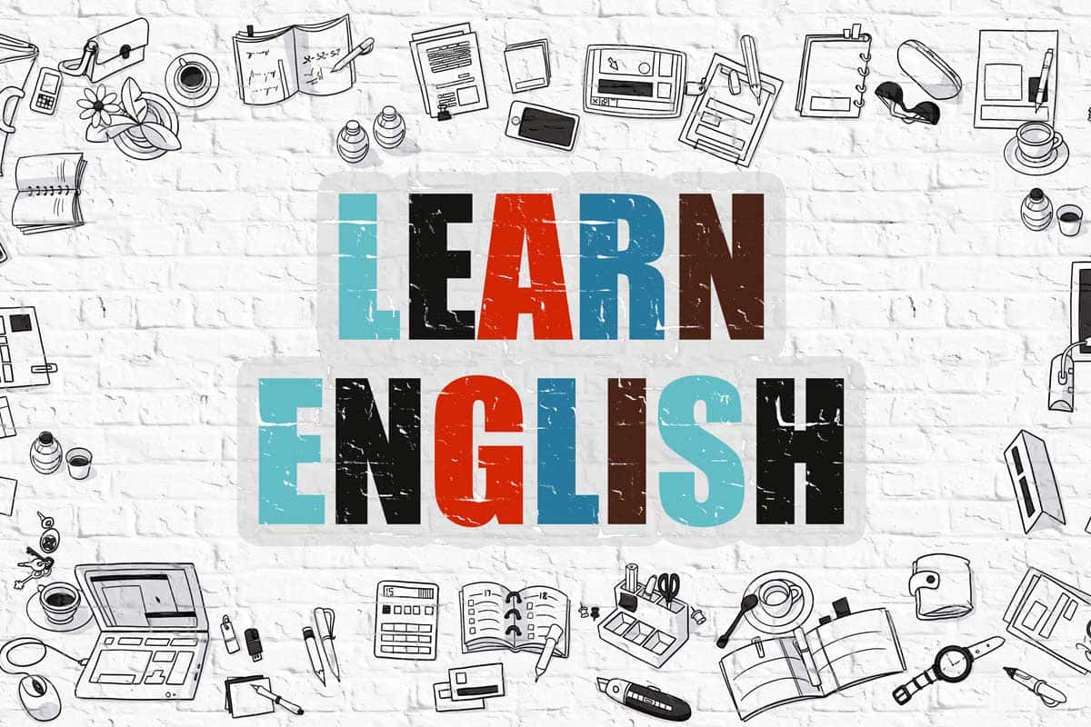 學習英語白磚牆數位藝術畫 壁紙 — 白色磚牆上色彩鮮豔的「學習英語」文字，周圍環繞著黑白學習塗鴉。
