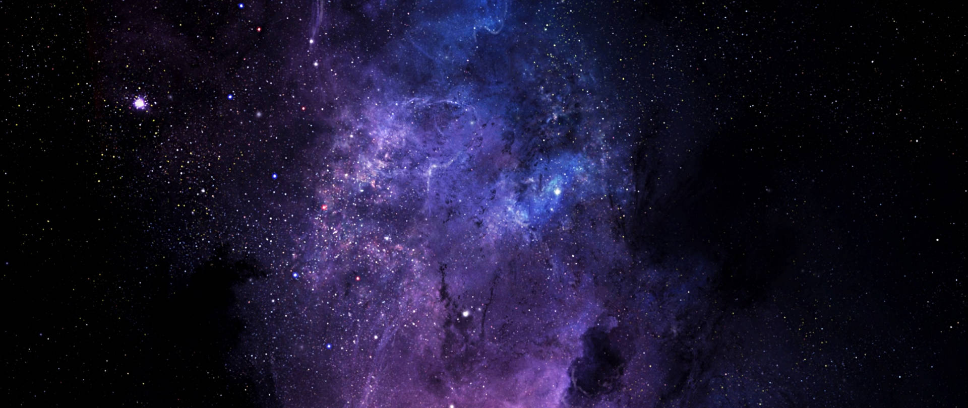在深空中與星星一起發光的鮮豔紫色和藍色星雲。