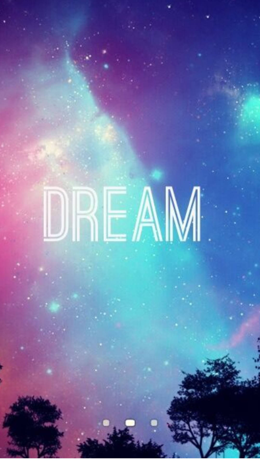 彩色星空和樹木剪影上的Dream文字