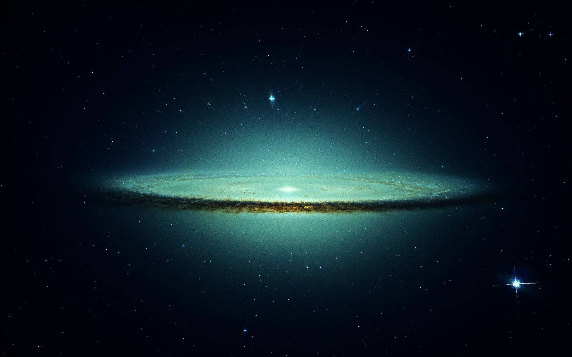 一個螺旋星系，帶有藍綠色旋臂和金色塵埃漩渦，在星場背景下。