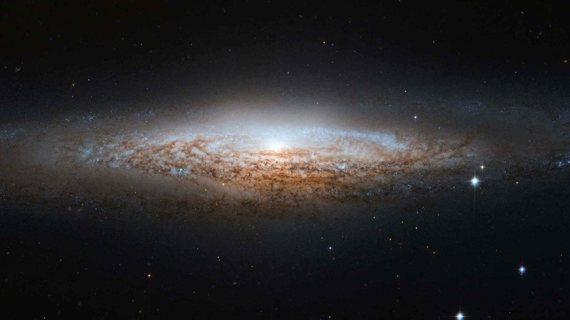 一個具有發光旋臂和明亮恆星的螺旋星系。