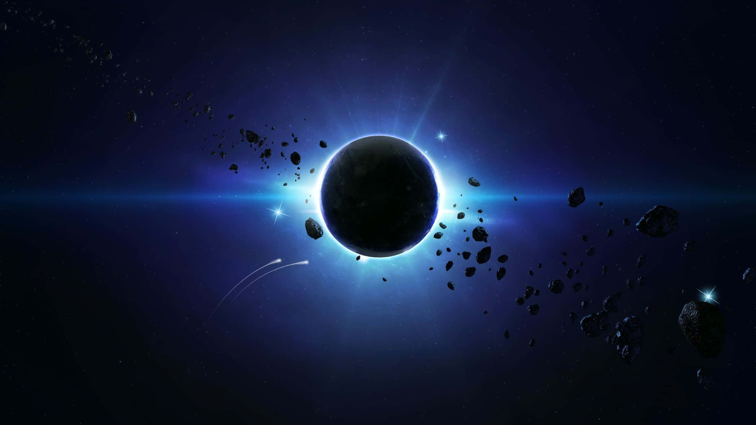 Universe 桌布 壁紙 — 宇宙日食，一顆黑暗行星在光芒四射的藍色星場襯托下呈現剪影，周圍環繞著漂浮的小行星。