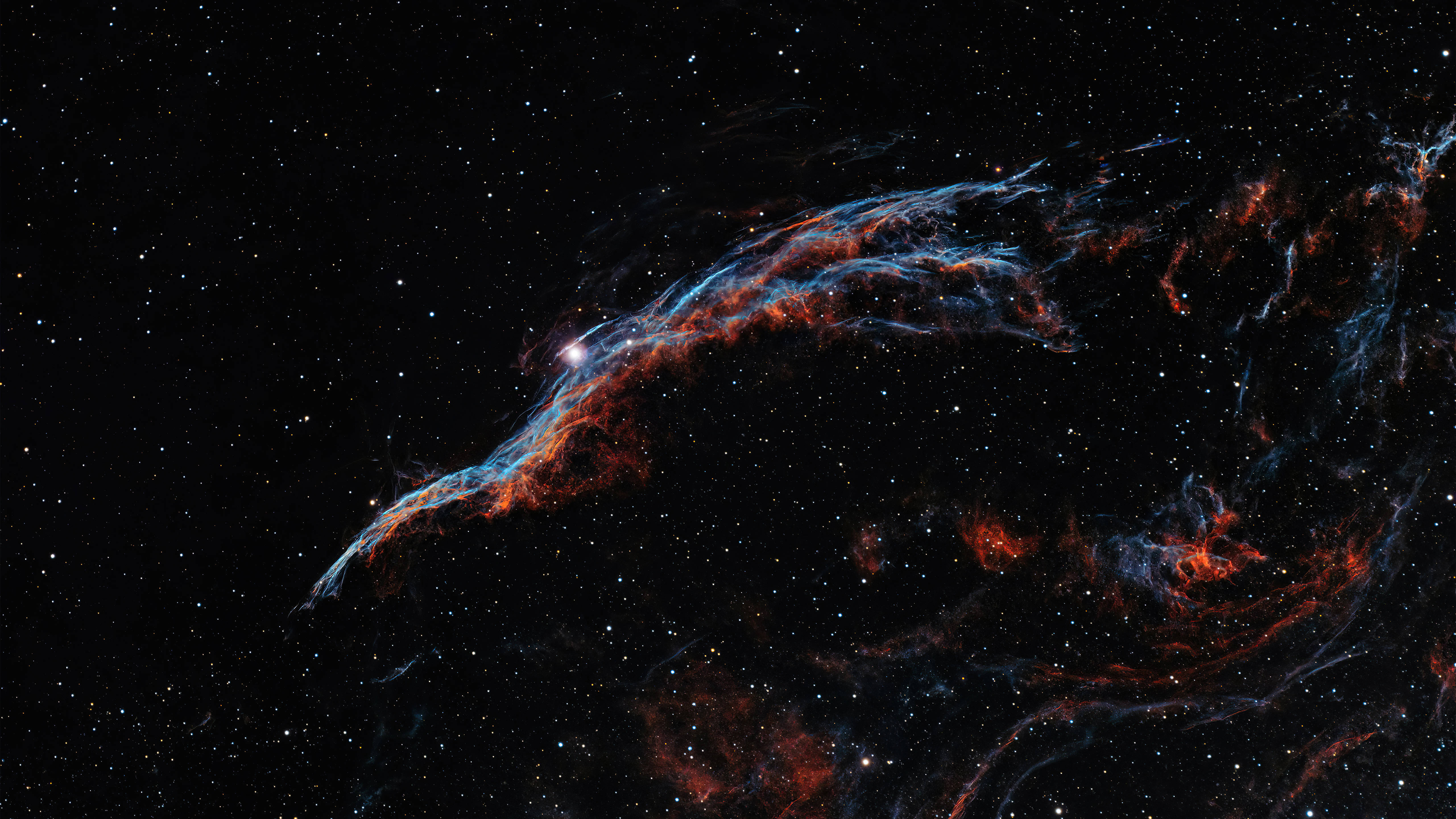 迷幻 桌布 壁紙 — 宇宙星雲在星空背景下以鮮豔的紅色和藍色旋轉。