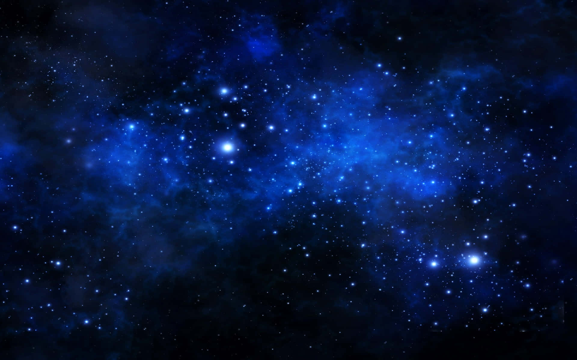 深空中帶有發光恆星和宇宙塵埃的廣闊藍色星雲。