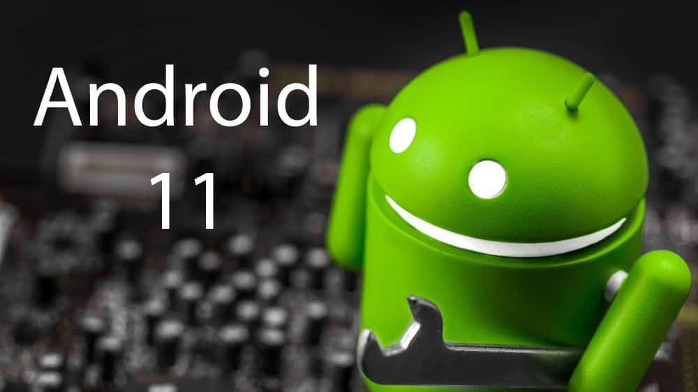 安卓作業系統 – 流暢且功能強大的作業系統 壁紙 — 一個亮綠色的Android吉祥物拿著扳手，站在模糊的電路板前，上面有「Android 11」文字。