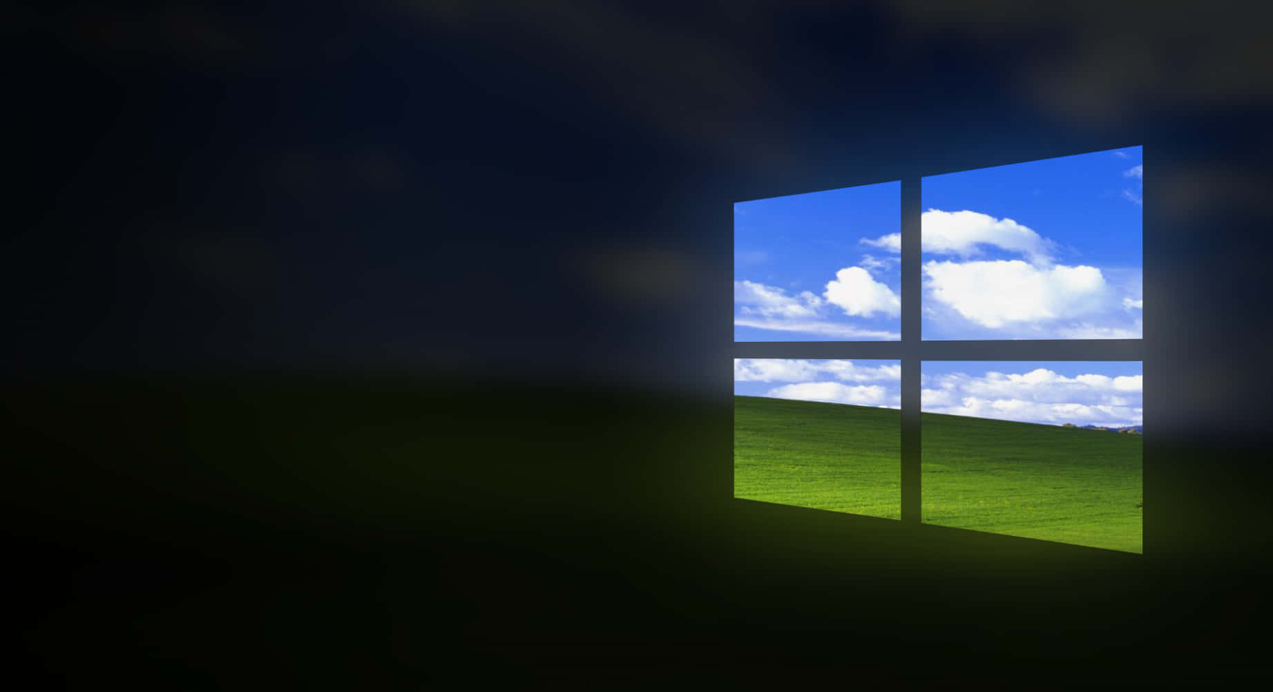 安裝 Windows 10 桌面系統 壁紙 — 一個發光的視窗圖示框住明亮的藍天、蓬鬆的雲朵和充滿活力的綠草，背景為深色。
