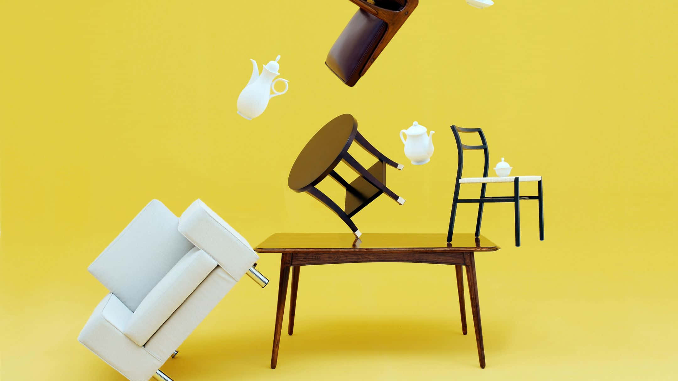 Furniture 桌布 壁紙 — 家具同茶具喺鮮黃色背景上動態漂浮，構成超現實靜物畫。