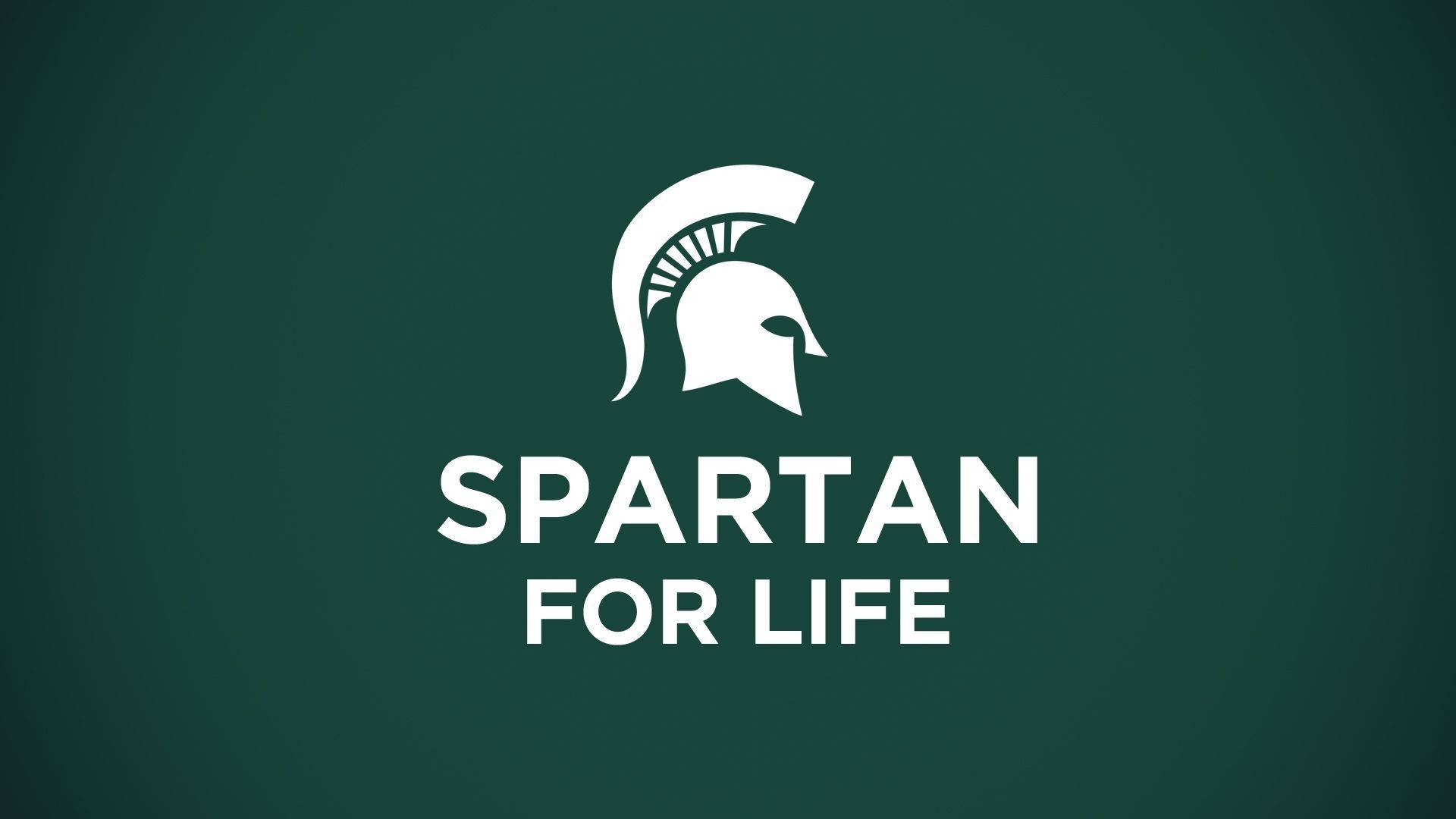斯巴達頭盔標誌，附有文字 Spartan for Life，置於綠色背景上。