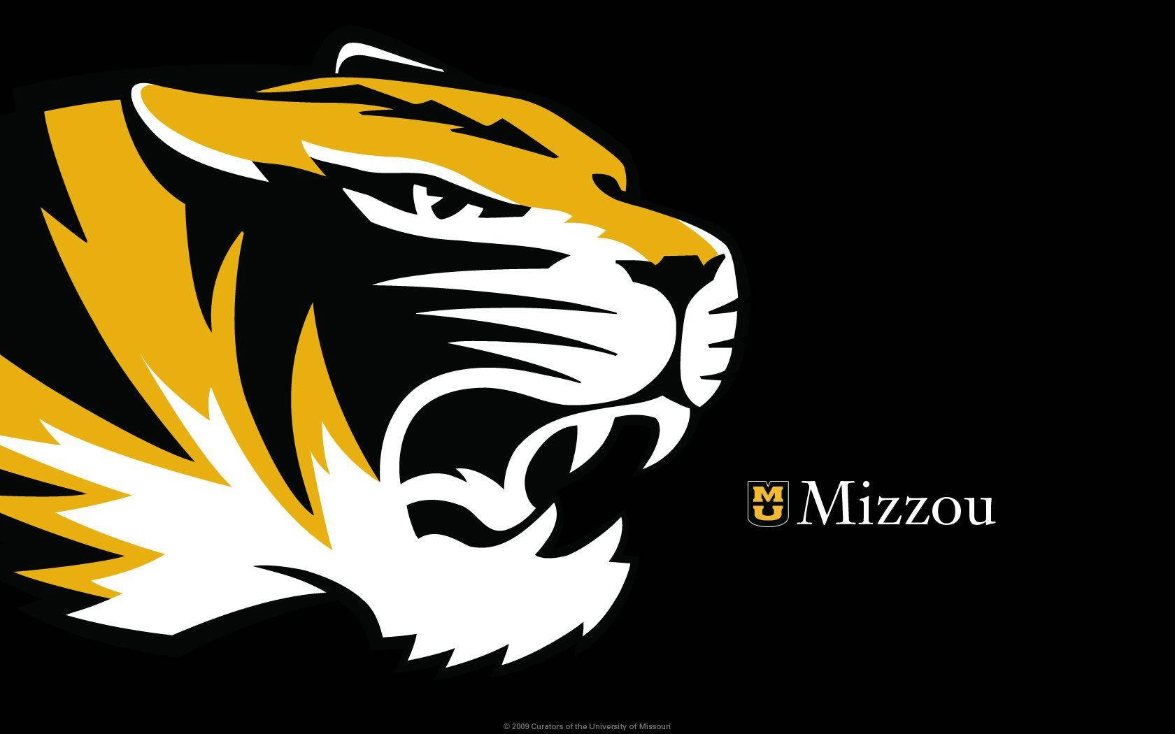 Mizzou 老虎吉祥物標誌，在黑色背景上採用金色、白色和黑色設計。