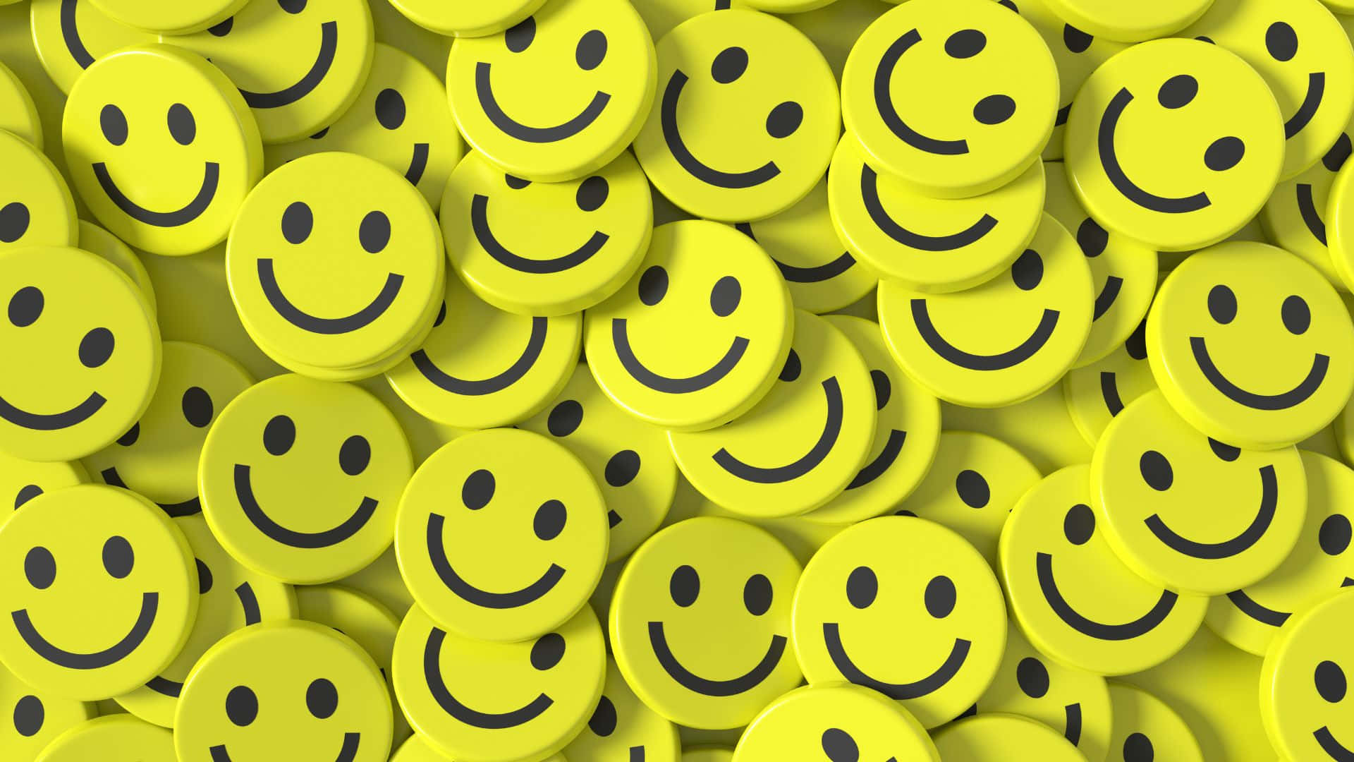 Smiley 桌布 壁紙 — 密集的亮黃色圓形笑臉按鈕，帶有黑色輪廓，營造出歡樂且重複的圖案。